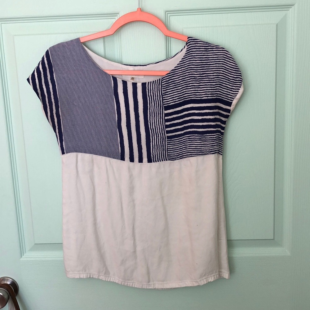 A white shirt with blue stripes